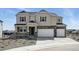 Charming two-story home with a three-car garage and manicured front yard at 5722 Farrier Pt, Castle Rock, CO 80104