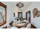 Elegant dining area with natural light and stylish decor, connecting seamlessly to the living space at 320 E Dakota Ave, Denver, CO 80209