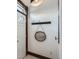 Welcoming foyer with a charming 'Home' sign and stylish decor near the front door at 320 E Dakota Ave, Denver, CO 80209