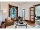 Comfortable living room featuring natural light and comfortable seating at 320 E Dakota Ave, Denver, CO 80209