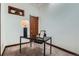 A well lit room with desk and chair at 320 E Dakota Ave, Denver, CO 80209