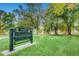 Washington Park entrance with lush greenery and mature trees at 320 E Dakota Ave, Denver, CO 80209