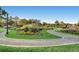 Expansive park featuring winding walking paths and colorful flower beds at 320 E Dakota Ave, Denver, CO 80209