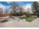 Outdoor space features a concrete patio with a picnic table, a hammock, and plenty of sunshine at 1419 Dexter St, Denver, CO 80220