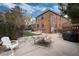 Outdoor space features a concrete patio with a picnic table, a hammock, and plenty of sunshine at 1419 Dexter St, Denver, CO 80220