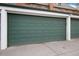 Exterior shot of the two-car garage, with two individual doors at 1419 Dexter St, Denver, CO 80220