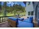 Outdoor deck with comfortable seating and scenic views of the surrounding landscape at 2191 Baldy Ln, Evergreen, CO 80439