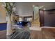 Beautiful home interior showcasing wood floors, elegant fireplace, and an open living area at 2191 Baldy Ln, Evergreen, CO 80439