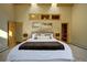 Spacious main bedroom with a skylight and stylish decor at 2191 Baldy Ln, Evergreen, CO 80439