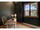 Cozy office space with a large window and a view of the mountains at 2191 Baldy Ln, Evergreen, CO 80439
