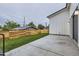 Spacious backyard with a concrete patio and wooden fence, providing a private outdoor space at 3019 Chase St, Wheat Ridge, CO 80214