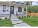 Charming home exterior showcasing a well-manicured lawn and a welcoming front entrance at 3019 Chase St, Wheat Ridge, CO 80214