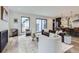 Stylish living room with hardwood floors and modern furniture, creating an inviting and comfortable atmosphere at 3019 Chase St, Wheat Ridge, CO 80214