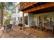 Outdoor patio with ample seating and a view of the backyard and upper deck at 4505 S Yosemite St # 433, Denver, CO 80237