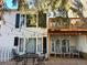A spacious backyard with a patio, outdoor seating, and string lights at 4505 S Yosemite St # 433, Denver, CO 80237