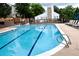 Refreshing community pool with lounge chairs, umbrellas, and well-maintained surroundings at 4505 S Yosemite St # 433, Denver, CO 80237