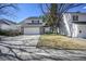 Charming two-story home features a two-car garage and well-manicured lawn at 4505 S Yosemite St # 433, Denver, CO 80237