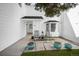 Inviting front porch features seating and decorative planters at 4505 S Yosemite St # 433, Denver, CO 80237