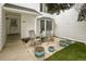 Inviting front porch with seating and manicured landscaping at 4505 S Yosemite St # 433, Denver, CO 80237