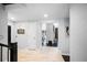 Bright hallway with tile flooring leading to various rooms at 4505 S Yosemite St # 433, Denver, CO 80237
