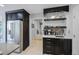 Gourmet kitchen with stainless steel refrigerator, built-in sink and modern fixtures at 4505 S Yosemite St # 433, Denver, CO 80237