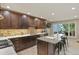 Spacious kitchen with a breakfast bar and stylish backsplash at 4505 S Yosemite St # 433, Denver, CO 80237