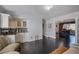 View of the sitting area through french doors off the kitchen at 4505 S Yosemite St # 433, Denver, CO 80237