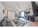 Cozy room features neutral color scheme, ceiling fan, window, tile floors, and storage closet at 4505 S Yosemite St # 433, Denver, CO 80237