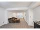 Spacious living room boasts French doors, plush carpet, and recessed lighting at 4505 S Yosemite St # 433, Denver, CO 80237