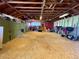Spacious barn interior with storage and equipment, offering ample space at 1740 Michael Gates Dr, Parker, CO 80138