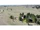 Aerial view of secluded property with trees and a single Gathering home at 1740 Michael Gates Dr, Parker, CO 80138