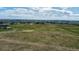 Aerial view of large land with the potential for building single Gathering homes at 1740 Michael Gates Dr, Parker, CO 80138