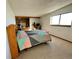Cozy bedroom with a double bed and built-in shelving at 1740 Michael Gates Dr, Parker, CO 80138