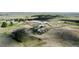 Scenic aerial view of the property featuring rolling hills and lush green trees at 1740 Michael Gates Dr, Parker, CO 80138