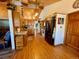 Galley kitchen featuring wood cabinets and hardwood floors at 1740 Michael Gates Dr, Parker, CO 80138