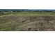 Gently sloping land features sparse vegetation and subtle undulations at 1740 Michael Gates Dr, Parker, CO 80138