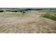Wide view of gently rolling land and sparse vegetation with a distant tree line at 1740 Michael Gates Dr, Parker, CO 80138