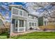 Backyard view features a patio, plush lawn, and home exterior at 2889 Windridge Cir, Highlands Ranch, CO 80126