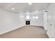 Basement with a fireplace, recessed lighting, carpet, and plantation shutters at 2889 Windridge Cir, Highlands Ranch, CO 80126