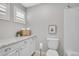 Bright bathroom with granite counters, toilet and shower at 2889 Windridge Cir, Highlands Ranch, CO 80126