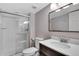 Updated bathroom featuring walk-in shower, stylish vanity, and modern fixtures at 2889 Windridge Cir, Highlands Ranch, CO 80126