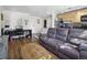 This room showcases hardwood floors, lots of light, and an open-concept layout at 1450 Albion St # 206, Denver, CO 80220