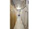 Basement storage units in a long, narrow storage room at 1450 Albion St # 206, Denver, CO 80220