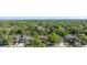 Scenic neighborhood street view with mature trees and well-kept homes creating a welcoming atmosphere at 1121 W Kettle Ave, Littleton, CO 80120
