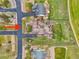 An aerial perspective captures the layout of a residential property with a well-maintained backyard and landscaping at 42225 Kingsmill Cir, Elizabeth, CO 80107