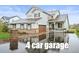Charming two-story home with a 4 car garage and a covered porch at 42225 Kingsmill Cir, Elizabeth, CO 80107