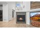 Fireplace and vaulted ceiling accents this living room's design at 42225 Kingsmill Cir, Elizabeth, CO 80107
