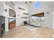 Bright living room with tall ceilings and modern fireplace at 42225 Kingsmill Cir, Elizabeth, CO 80107
