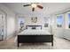 Relaxing main bedroom with generous windows and comfortable furnishings at 42225 Kingsmill Cir, Elizabeth, CO 80107
