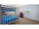 Bright bedroom with bunk beds, a dresser, and a large window, creating a cozy and functional space at 4797 Longs Peak St, Brighton, CO 80601